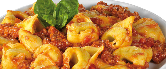 Tortelloni With Ricotta Cheese, Spinach and Ragù (Meat Sauce)